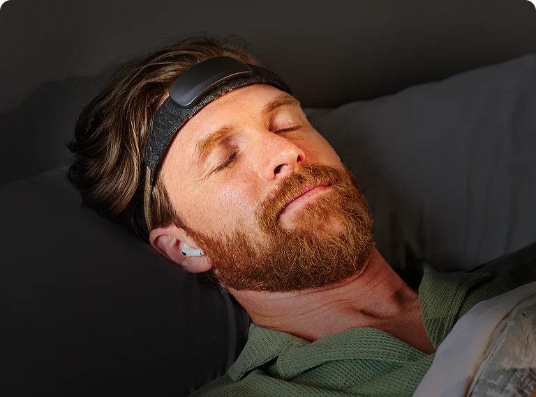 A person relaxing while wearing the Psio neurofeedback headband